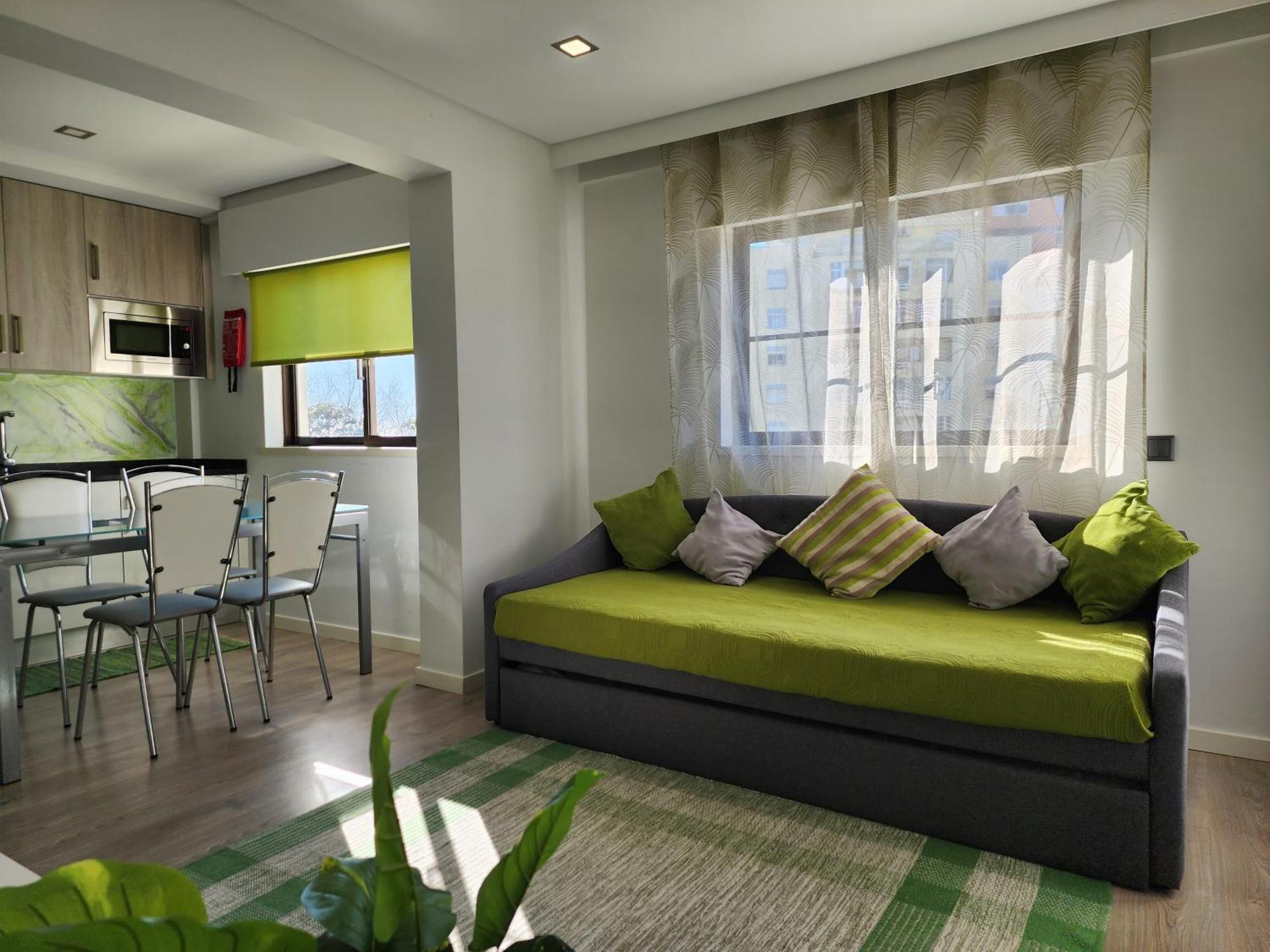 Ria Center Apartment - Left Faro Luaran gambar